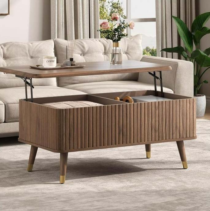 Modern wooden lift top coffee table with fluted storage compartment in a living room